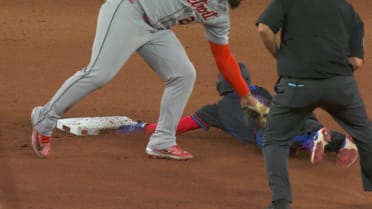 Myles Straw steals second base after a review