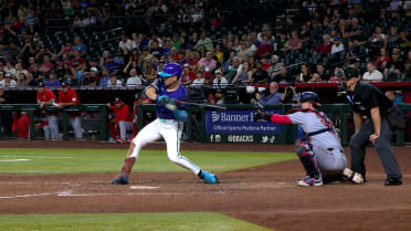Corbin Carroll is hit by the pitch after a review